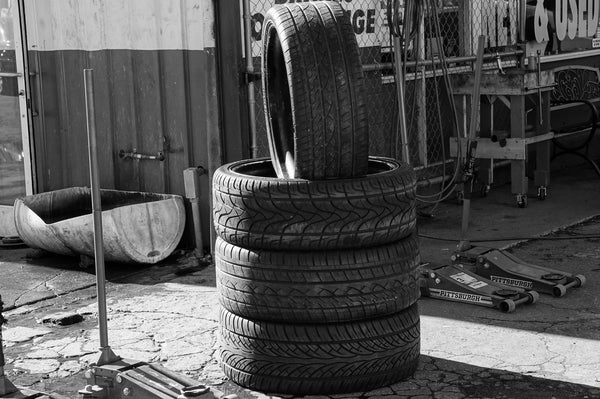 Car tire with valve stem sensor for tire pressure monitoring system