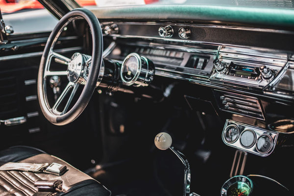 Car windshield and dashboard viewed from inside the vehicle