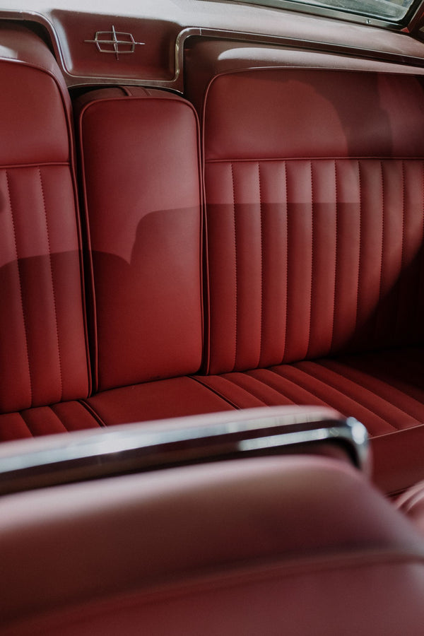 Car interior footwell with protective floor mat installed