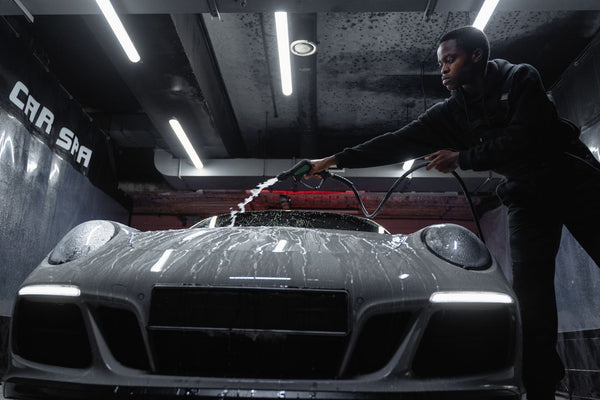 Applying ceramic coating sealant to car paint with an applicator pad